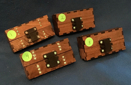 bookmatched walnut mini boxes with torquoise and 3d printed latches and hinges