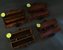 bookmatched walnut mini boxes with torquoise and 3d printed latches and hinges inside